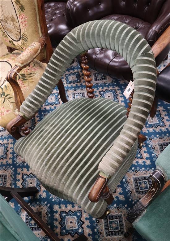 A Victorian spiral turned walnut upholstered elbow chair